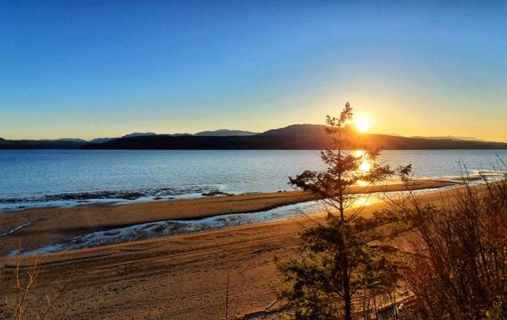 Sunset from Chevy Chase Beach Cabins, a cabin rental near Seattle for families, and one of many fall things to do 