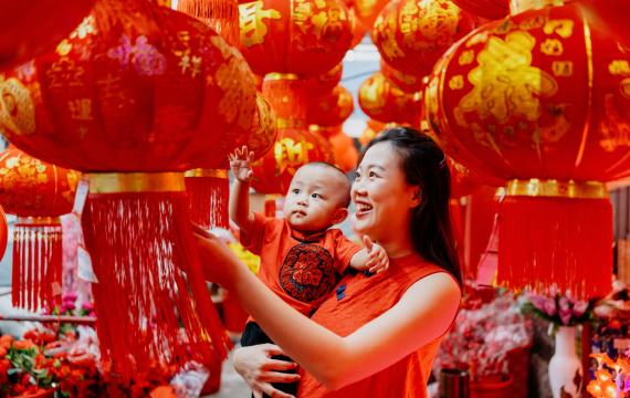 mother and child celebrating Chinese New Year in the Year of the Snake 2025