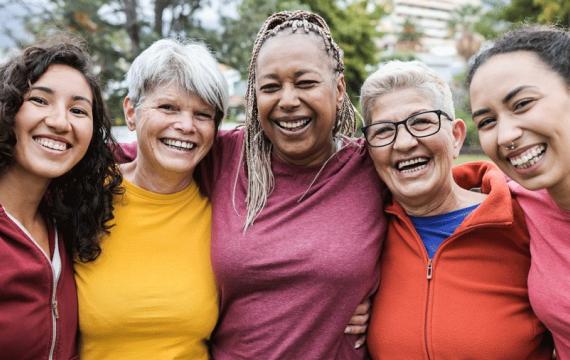 A group of women wearing colorful shirts don't think too much about how they look