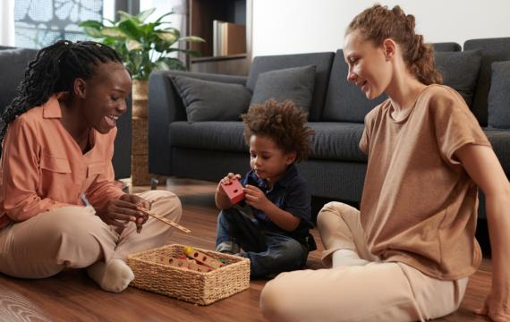 moms playing with child at home