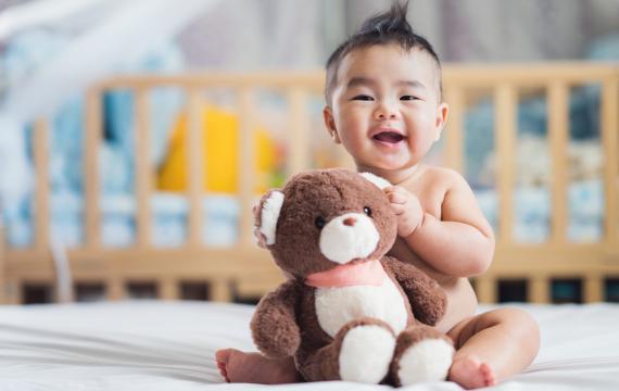 cute baby holding a teddy bear