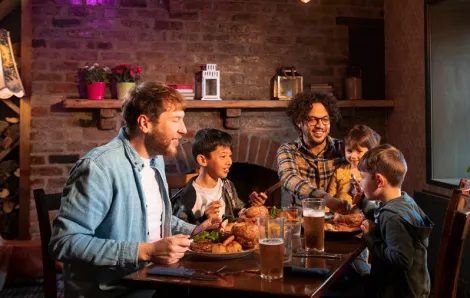 family enjoying comfort food at a Seattle restaurant