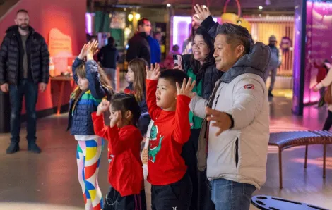 Families interacting with the "Brainy Bodies" exhibit at Pacific Science Center, one of many weekend activities for Seattle families