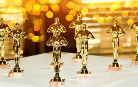 Oscar statues on a table