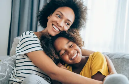 Mother and Daughter Hugging