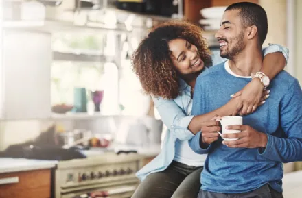 Couple-having-coffee-together-at-home