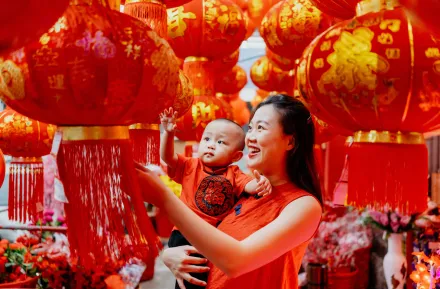 mother and child celebrating Chinese New Year in the Year of the Snake 2025