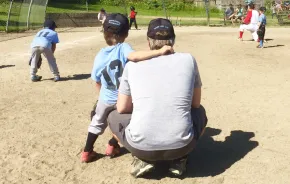 Youth sports baseball dad and son
