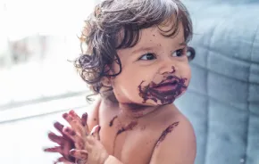 a child enjoys Brazil's superfruit, a healthy dessert recipe