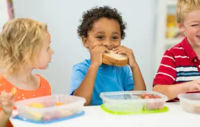 Three kids at school eating a quick and easy lunch