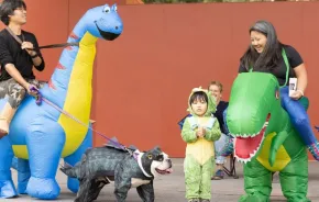 A family in costume at Volunteer Park's Halloween Pet Parade is a free thing to do in Seattle