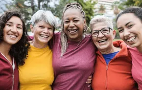 A group of women wearing colorful shirts don't think too much about how they look