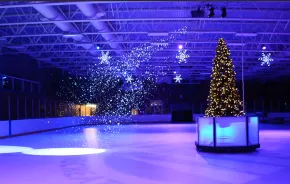 Seattle ice-skating this season includes Sprinker Ice Rink Ice Lights where families and kids ice skate and go on ice bumper cars with snow falling